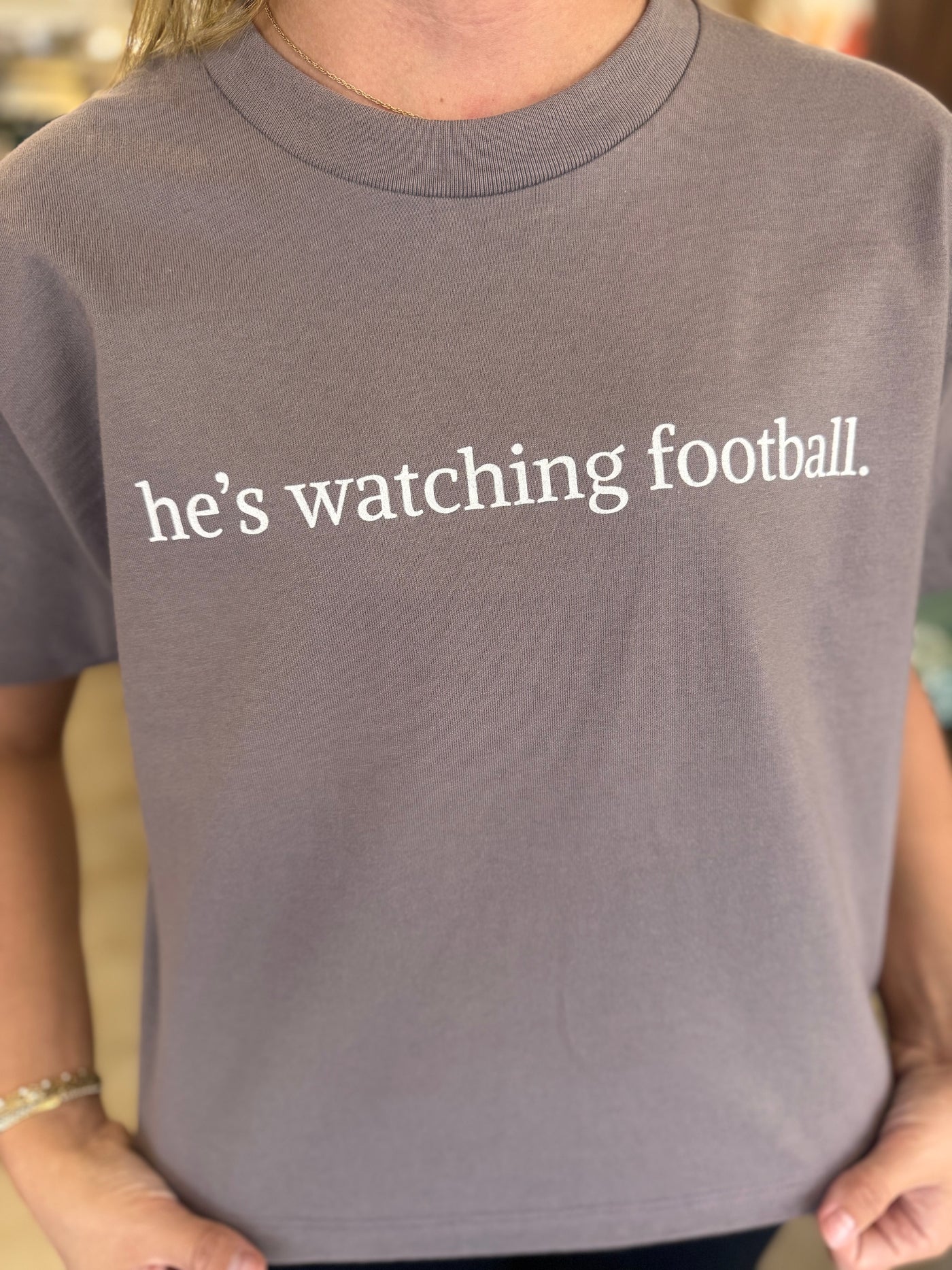 He’s Watching football boxy tee